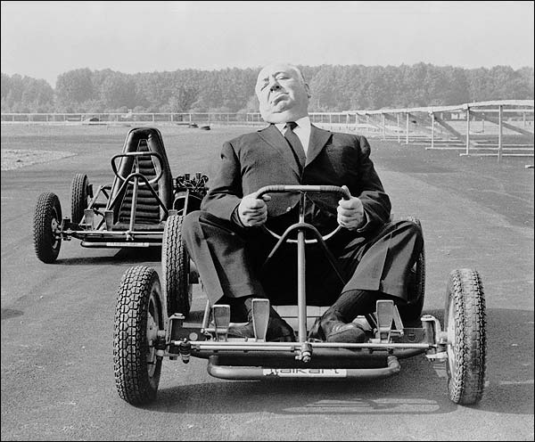 Sir Alfred Hitchcock Posed on Go-cart Photo Print for Sale