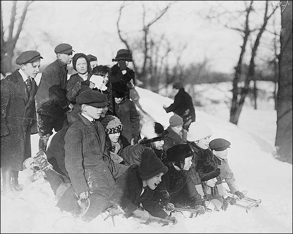 Children w/ Snow Sleds in Central Park NYC Photo Print for Sale