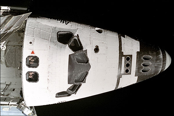 Astronauts Look Out Space Shuttle Window Photo Print for Sale